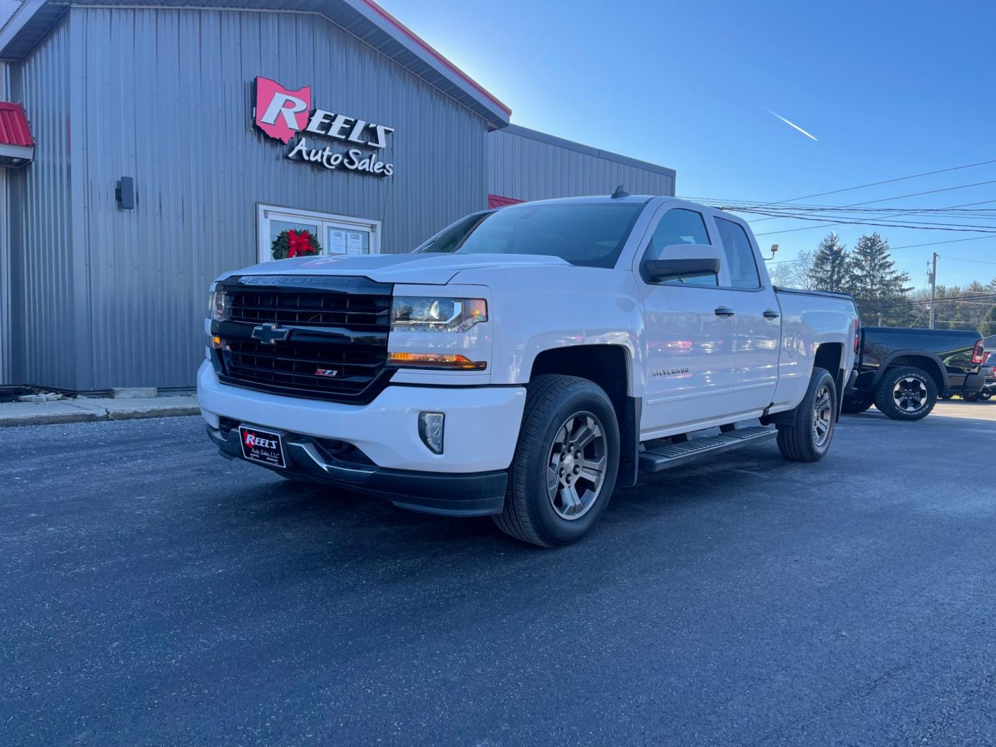 2017 White /Black Chevrolet Silverado 1500 LT Z71 Double Cab 4WD (1GCVKREC8HZ) with an 5.3L V8 OHV 16V engine, 6-Speed Automatic transmission, located at 11115 Chardon Rd. , Chardon, OH, 44024, (440) 214-9705, 41.580246, -81.241943 - Photo#0